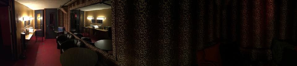 A panoramic view of our leopard print green room in Salt Lake. We found a fake eye lash under one of the pillows. 