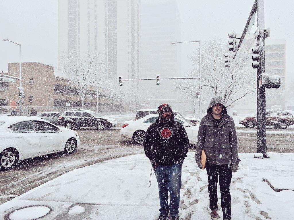 Tim and Nick walking downtown Denver in the snow to mail out a T-shirt. Such dedication.